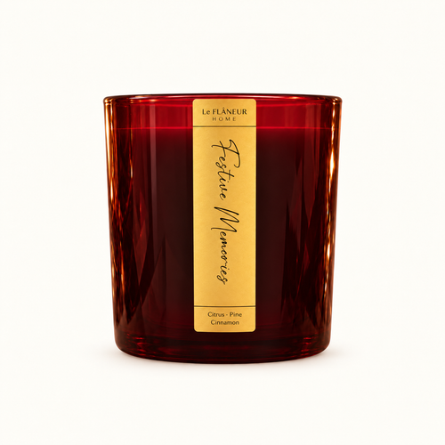 Festive Memories Scented Candle by Le Flâneur Home, unlit on an ivory background.