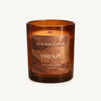 Firenze Scented Candle by Le Flâneur Home, unlit on an ivory background.