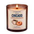 Lit Chicago Coffee & Doughnuts scented candle by Le Flâneur Home in an amber glass jar with a wooden wick.