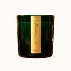 Mountain Lodge Scented Candle by Le Flâneur Home, unlit on an ivory background.