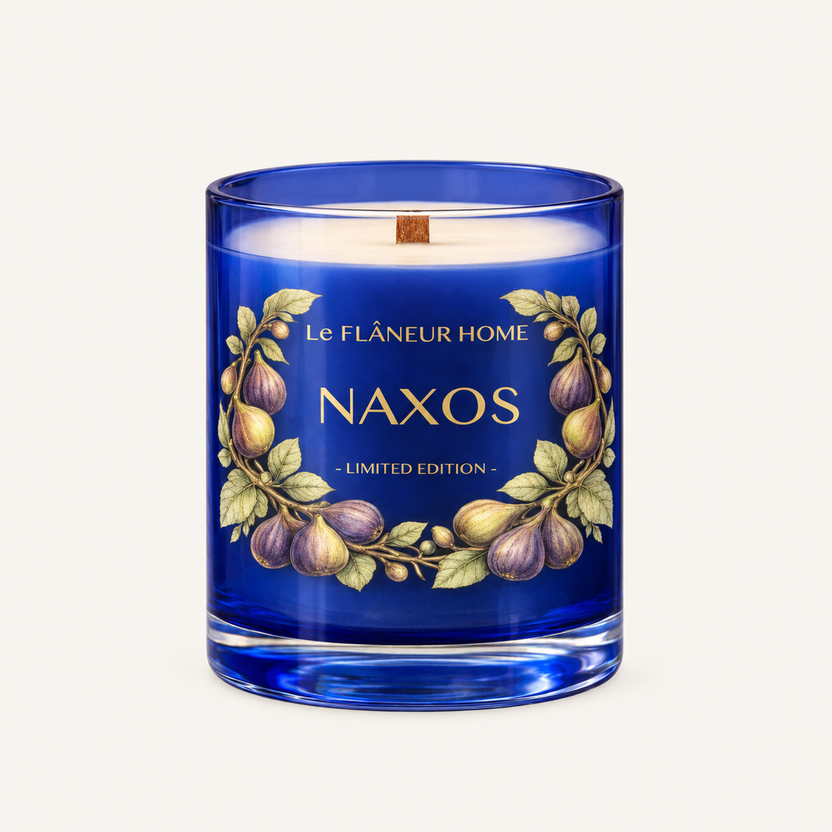Naxos Scented Candle by Le Flâneur Home, unlit on an ivory background.
